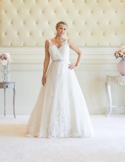 lace wedding dress with crystal belt detail