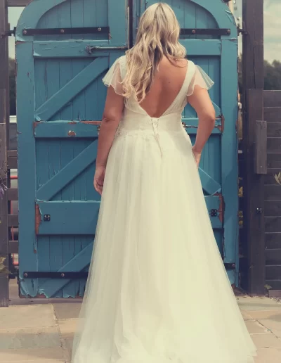 low back plus size wedding dress with floaty sleeve