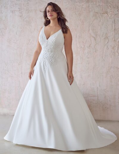 Plus size satin and lace ballgown Maggie Sottero wedding dress